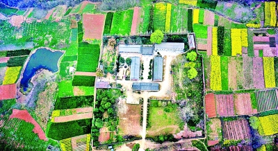 空中鸟瞰龙岗寺国家考古遗址公园（2014年3月27日摄）。图中的龙岗寺位于新旧石器时代的交界处，以东为新石器时代遗址，以西为旧石器时代遗址。新华社记者 陶明摄